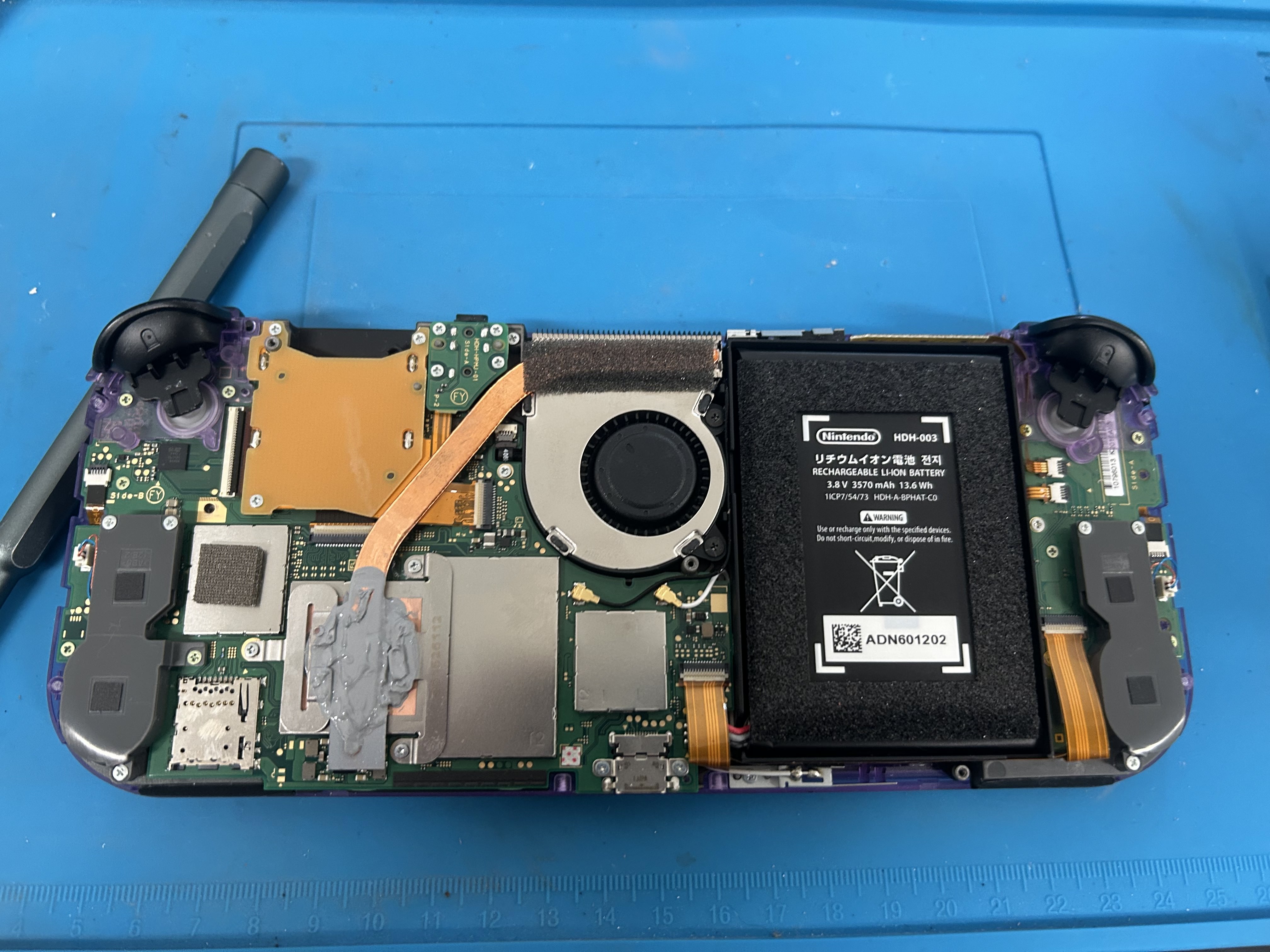 Picofly modchip installed on Switch Lite board